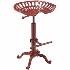 a red stool with an adjustable foot rest