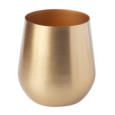 a gold colored metal cup on a white background