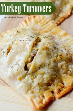 two turkey turnovers on a cutting board with the words turkey turnovers over them