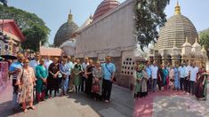 a group of people standing around each other in front of a building with many spires