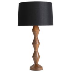 a wooden table lamp with a black shade