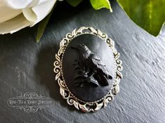 This striking cameo design brings to mind the Edgar Allan Poe poem, 'The Raven'. Elegant, and a little bit mysterious, this pin brooch will look stunning on a coat lapel or cardigan. As always, wear however you want! Packaging: PLEASE READ THE BELOW OPTIONS CAREFULLY SO THAT YOU SELECT THE OPTION MOST APPROPRIATE FOR YOUR NEEDS :) xx All pieces are sent in pretty, gift ready packaging including a useful general care card. *Choose the 'YES GIVING IN PERSON' option if you are giving this item as a Viking Raven, Modern Vintage Fashion, The Raven, Edgar Allan, Cameo Brooch, Black On Black, Edgar Allan Poe, Care Card, Purple Backgrounds