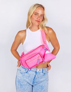 Our Fanny Sling is the cross body bag you've been waiting for! This silhouette hugs your body in all the right places and is the perfect medium size that will hold your necessities without weighing you down. Features super soft match nylon webbing, tonal piping details, match buckle, a padded exterior for extra comfort and insulation, 3 separate zipper compartments, and two additional pockets in the main compartment. Coordinating paracord pulls make opening this bag a cinch! Comes with a matchin Nylon Crossbody Belt Bag For School, Nylon Crossbody Belt Bag With Removable Pouch, Everyday Nylon Belt Bag, Nylon Crossbody Belt Bag With Zipper Pocket, Sporty Nylon Belt Bag With Removable Pouch, Sporty Nylon Belt Bag With Zipper Closure, Trendy Nylon Crossbody Belt Bag, Sporty Nylon Chest Bag With Functional Pockets, Functional Chest Bag For Outdoor Activities