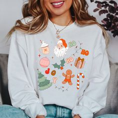 Enjoy the holiday season with this cute and retro Christmas sweatshirt. This unisex sweater also makes a perfect gift for any family, teacher or special person in your life. Get this item just in time for the season. Christmas Sweater, Merry and Bright, Merry Christmas, Happy Holidays, Christmas Tree Shirt, Mom Sweater, Teacher Tee, Cozy Season Sweatshirt Ideal for any situation, a unisex heavy blend crewneck sweatshirt is pure comfort. These garments are made from polyester and cotton. This combination helps designs come out looking fresh and beautiful. The collar is ribbed knit, so it retains its shape even after washing. There are no itchy side seams on these sweaters.  .: 50% cotton, 50% polyester .: Medium-heavy fabric (8.0 oz/yd² (271.25 g/m .: Loose fit .: Sewn-in label .: Runs true Casual Graphic Print Sweatshirt For Holiday, Cute Winter Sweater As A Gift, White Letter Print Sweater As Gift, Casual Holiday Sweater With Graphic Print, White Holiday Sweater As Gift, White Holiday Sweater As A Gift, White Christmas Sweater As A Gift, White Christmas Sweater As Gift, White Sweatshirt For Winter Gift