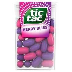 purple and pink jelly beans in a plastic container with the tag berry bliss on top