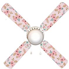 a pink ceiling fan with floral designs on it