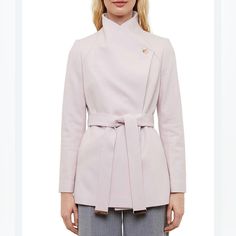 Ted Baker Rosess Wool Wrap Short Coat Nwt Ted Sz 2 Us Sz 6 Ted Baker Rosess Coat Ted Size: 2 ; Regular Size L Color: Pink Design/Style: Slim Fit, Short Length, Tie-Knot Belt, Button Fastening, Metallic Tipping, Lined, Pockets. Neckline: Collar Sleeves: Long Materials: 70% Wool, 25% Polyamide, 5% Cashmere Style #: 249308 Measurements (Approximate And Taken Lying Flat) Chest: 17“ Length: 31“ Sleeves: 26“ Condition: New With Tag And In Excellent Condition. No Stains, Snags, Or Holes. Designer Pink Workwear Outerwear, Feminine Lapel Collar Outerwear For Office, Tailored Feminine Outerwear For Fall, Feminine Tailored Outerwear For Fall, Feminine Outerwear With Lapel Collar For Office, Feminine Office Outerwear With Lapel Collar, Tailored Feminine Spring Outerwear, Feminine Winter Office Outerwear, Feminine Winter Workwear Outerwear