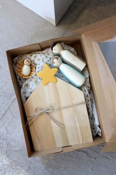 an open box with soaps and other items in it