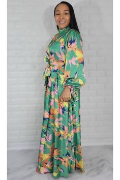 Material: Satin Style: Maxi Dress Long Sleeve Color: Green & Mul Fit True to size. The model is wearing a size Small with 36 Bust Size Recommended Small = 4/6 Medium= 8 Large= 10 XL = 12 1XL= 14