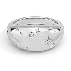 a white gold ring with stars on it