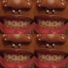 a woman's mouth with gold studs on it