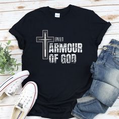 Christian shirts: Armour of God shirt for men and women, Faith Based Shirt, Bible shirt for him and her, Christmas Gift for friend, mom, dad. You've now found the staple t-shirt of your wardrobe. It's made of 100% ring-spun cotton and is soft and comfy. The double stitching on the neckline and sleeves add more durability to what is sure to be a favorite!   * 100% ring-spun cotton * Sport Grey is 90% ring-spun cotton, 10% polyester * Dark Heather is 65% polyester, 35% cotton * 4.5 oz/yd² (153 g/m²) * Pre-shrunk * Shoulder-to-shoulder taping * Quarter-turned to avoid crease down the center KEEP SHOPPING ❧ Return to my main shop page here: https://www.etsy.com/shop/PlusAdore This product is made especially for you as soon as you place an order, which is why it takes us a bit longer to deliver God Shirt Ideas, Christian Shirts Men, Christian Shirts Designs Men, Christian Shirts For Men, Christian T Shirts Designs, Worship Craft, Christian T Shirt Ideas For Men, Christian Tshirt Design Ideas Men, Armor Of God Shirt Ideas