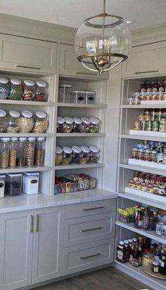 an organized pantry with lots of food in it