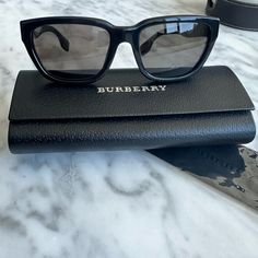 Men’s Black Burberry Sunglasses, Never Worn. No Scratches, Original Case And Sunglasses Cleaner Business Black Sunglasses With Square Frame, Business Black Square Frame Sunglasses, Designer Black Sunglasses For Business, Designer Business Sunglasses With Tinted Lenses, Luxury Wayfarer Sunglasses For Business, Luxury Business Wayfarer Sunglasses, Designer Sunglasses With Gradient Lenses For Everyday, Designer Sunglasses With Tinted Lenses For Everyday, Luxury Black Sunglasses For Travel