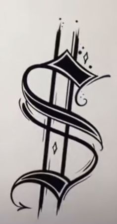 a black and white drawing of a letter s on a sheet of paper with writing underneath it