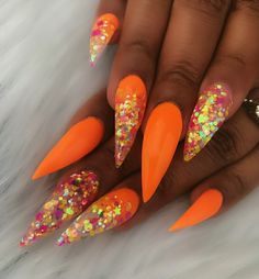 Orange And Glitter Nails, Orange Glitter Nails Acrylic, Orange Stiletto Nails, Orange Glitter Nails, Orange Glitter Tips Acrylic Nails, Orange Nails Sparkle, Bright Orange Nails With Glitter, Sparkly Orange Nails, Glittery Orange Nails