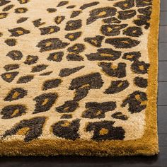 an animal print rug on a wooden floor