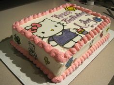 a hello kitty birthday cake with pink frosting