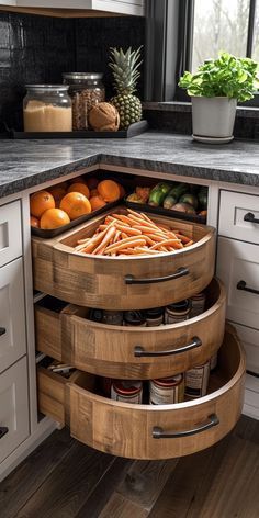 an open cabinet in the middle of a kitchen filled with fruits and vegetables, including carrots