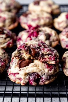 cookies with chocolate chips and cranberries on a cooling rack