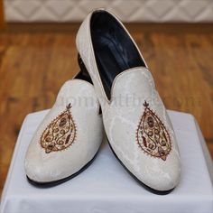 Shoes are the finishing touch to every outfit, so get customize this Uomo Attire's self textured fabric #white #shoes with micro embellishments to give the finishing touch to your wedding outfit. - Color is absolutely stunning. - It's custom-made, so it's guaranteed to fit you perfectly. For online prices plz visit: https://uomoattire.com/ or ☎️ Call/WhatsApp on +92300-7668666 / 0300-7618666 White Embroidered Closed Toe Wedding Shoes, White Pearl Embroidered Wedding Shoes, Formal Embroidered Wedding Shoes With Round Toe, White Closed Toe Formal Wedding Shoes, White Luxury Almond Toe Wedding Shoes, Luxury White Almond Toe Wedding Shoes, Elegant Embroidered Wedding Shoes, Elegant White Embellished Wedding Shoes, Formal White Embellished Wedding Shoes