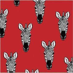 a red background with black and white zebras on it's sides, all facing the same direction