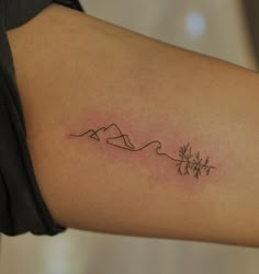 One line mountain tattoo on the inner arm Oceans And Mountains Tattoo, Forest Ocean Tattoo, Mountains Waves Tattoo, Mountain Water Sun Tattoo, Tree Mountain Wave Tattoo, White Water Rafting Tattoo, Mountain Simple Tattoo, Mountain Arm Tattoo Women, Hawaii Mountain Tattoo