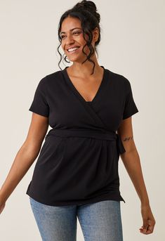 A soft and stretchy wrap top, thoughtfully designed to flatter your growing belly while discreetly offering effortless nursing access. The wide cuff on the sleeves can be worn up or down for added versatility. With an elastic band at the back, it accentuates your waistline, creating a flattering silhouette. This is the perfect, versatile everyday essential for moms at all stages!


Soft and stretchy cotton jersey
Sustainable material: 92% organic cotton and 8% elastane
Made in Portugal by Erius Nursing Tank Top, Post Partum Outfits, Nursing Tank, Growing Belly, Black Playsuit, Pregnancy Tshirts, Nursing Tops, Nursing Clothes, Maternity Pants