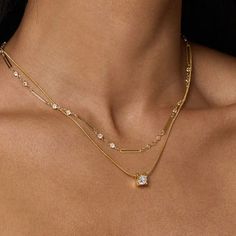 Add a touch of minimalist elegance with our Jenna Necklace. Featuring a sleek chain and a single round CZ crystal charm, this simple design is perfect for any occasion. Elevate your style effortlessly with the understated beauty of the Jenna Necklace. Material: 14k Gold Filled, Cubic Zirconia Size: 18"L | Pendant: 0.35" Closure: Lobster Dainty Cubic Zirconia Chain Necklace With Delicate Chain, Elegant Everyday Solitaire Necklace With Adjustable Chain, Dainty Cubic Zirconia Delicate Chain Necklace, Minimalist Cubic Zirconia Chain Necklace As Gift, Everyday Solitaire Necklace With Delicate Cubic Zirconia Chain, Elegant Everyday Crystal Necklaces, Delicate Cubic Zirconia Chain Necklace, Everyday Adjustable Cubic Zirconia Chain Necklace, Elegant Everyday Solitaire Necklace With Delicate Chain