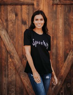 Live Halloween the way you should with our "Spooky" Graphic Tee, it's the perfect way to be more confident! Sizing: Small: 0-4 Medium: 6-8 Large: 10-12 XLarge: 12-14 XXLarge: 14-16 Measurements: 26" Long Materials: 95% COTTON 5% SPANDEX True to size, standard fit See complete model sizing Click here to learn more about Shipping and Processing Click here to read our Return Policy Edgy Letter Print T-shirt For Fall, Black Witchy Tops With Letter Print, Spooky Black Pre-shrunk Tops, Spooky Short Sleeve Tops For Fall, Witchy Tops For Halloween Streetwear, Casual Halloween Tops With Letter Print, Witchy Streetwear Tops For Halloween, Casual Halloween Letter Print Top, Spooky Halloween Tops