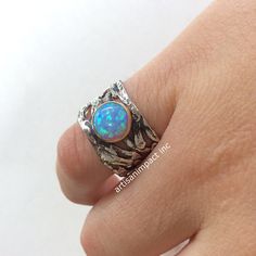 Wide silver band Sterling silver gold ring Blue by artisanlook Unique Silver Opal Promise Ring, Unique Sterling Silver Open Opal Ring, Silver Fusion Style Opal Ring For Anniversary, Silver Fusion Opal Ring For Anniversary, Unique White Gold Sapphire Ring, Silver Gold Ring, Wide Silver Band, Blue Opal Ring, Blue Gemstone Rings