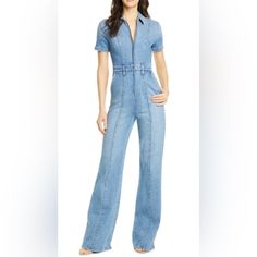 This Wide-Leg Denim Jumpsuit Cut From Light-Wash Stretch Denim Stays True To Its 70s Roots With Center Stitched Seams Running From Shoulder To Hem. (Nwt Front Zip Closure Spread Collar Short Sleeves Front Slant Pockets Belt Loops Lined 98% Cotton, 2% Bust 16.5” Waist 13.5” Inseam 33.5” Fitted Wide Leg Overalls For Workwear, Full-length Denim Jumpsuit For Spring Workwear, Fitted Denim Jumpsuit With Wide Leg For Workwear, Fitted Straight Leg Summer Denim Jumpsuit, Fitted Denim Jumpsuit With Straight Leg For Summer, Fitted Denim Jumpsuit For Summer With Straight Leg, Fitted Straight Leg Summer Overalls, Summer Fitted Straight Leg Overalls, Denim Blue Wide Leg Fitted Jumpsuits And Rompers