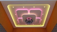 the ceiling is decorated with pink and white lights