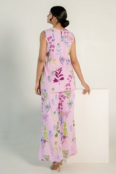 Light orchid kurta with floral print and tie-up straps. Paired with flared pant. - Aza Fashions Sleeveless Multicolor Sets With Printed Motifs, Multicolor Sleeveless Sets With Printed Motifs, Sleeveless Pink Palazzo Set For Summer, Sleeveless Pink Summer Palazzo Set, Sleeveless Pink Pant Set, Pink Sleeveless Pant Set, Women Kurta, Straight Kurta, Set Women