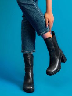 The classic Chelsea boot shape is a modern interpretation of the timeless classic.Retro material: It uses the classic retro color scheme of black and brown, with square toe, elastic side panels and pull rings, which is comfortable and easy to put on and take off. It is classic and versatile, and will elevate your fashion taste to a new height.The sturdy thick outsole is matched with a thick square heel, which is comfortable and durable, and enhances your temperament.Come and have a pair of winte Boots Black Women, Chunky Platform Boots, Winter Boots Black, Platform Boots Chunky, Boots Women Fashion, Womens Mid Calf Boots, Chunky Platform, Retro Color, Chelsea Boot