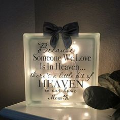 a light up sign that reads because someone we love is in heaven there's a little bit of heaven in our home