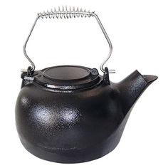 a black tea pot with a metal handle