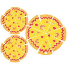 three slices of pizza with different designs on them