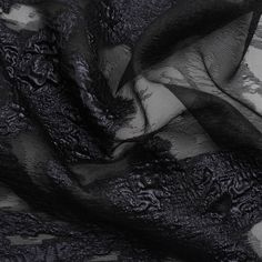 black and white photograph of sheer fabric