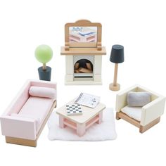 a dollhouse living room with furniture and accessories