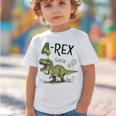 a young boy wearing a white 4 - rex shirt