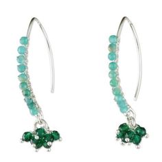 Designed by Thai artisan Sareeyakarn these dancing cluster earrings display the beauty of amazonite. Long hooks of sterling silver are beaded with the cool gem and petite green glass beads dangle below. Sterling Silver Jewelry With Green Dangling Beads, Green Gemstone Bead Drop Earrings, Sterling Silver Gemstone Beads Dangle Earrings, Sterling Silver Gemstone Bead Earrings, Sterling Silver Dangle Earrings With Gemstone Beads, Sterling Silver Earrings With Round Gemstone Beads, Green Sterling Silver Beaded Earrings With Round Beads, Earrings Display, Bar Jewelry