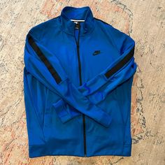 Blue Men's Large Nike Track Jacket Never Worn - No Tags Casual Blue Track Jacket For Winter, Casual Blue Winter Track Jacket, Nike Blue Outerwear For Fall, Blue Nike Outerwear For Fall, Blue Winter Track Jacket For Sports, Blue Long Sleeve Track Jacket For Outdoor, Blue Long Sleeve Sport Coat, Nike Blue Outerwear For Streetwear, Nike Blue Track Jacket For Streetwear