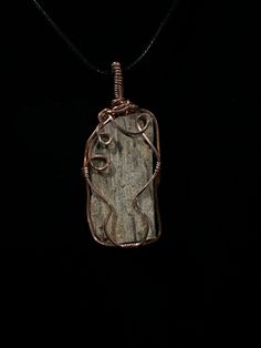 This beautiful natural petrified wood piece was found in west Texas USA . Perfect for anyone who loves nature and history of the planet .  The history this fossil has seen is baffling and the story is your's to tell. Did it grow among our ancient mammalian ancestors , or did it watch dinosaurs brawl amongst the marsh lands? This piece is raw and has not been polished or altered in any way. Take a look at some of our other fossil jewelry. Fossilized wood https://www.etsy.com/listing/1256039229/na Earthy Jewelry With Natural Variations, Handmade Natural Wood Pendant Jewelry, Rustic Natural Stone Necklace Gift, Earthy Necklace With Natural Variations For Gifts, Earthy Necklace With Natural Variations As A Gift, Earthy Style Necklace With Natural Variations For Gift, Rustic Brown Healing Necklace, Unique Natural Wood Pendant Jewelry, Nature-inspired Natural Stones Jewelry