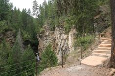 stairs lead up to the top of a cliff