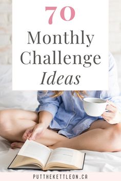 a woman sitting on her bed with an open book and cup of coffee in front of her