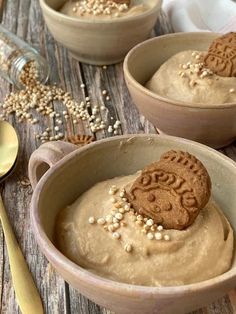 two bowls filled with peanut butter and cookies