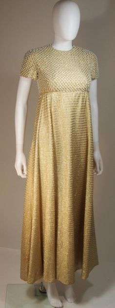 GEOFFREY BEENE 1960's Gold Lame Pearl Bodice Baby Doll Gown Size 2-4 4 Gold Sleeveless Sequined Gown, Gold Sequined Sleeveless Gown, Gold Sleeveless Gown With Sequins, Sleeveless Gold Gown With Sequins, Gold Sleeveless Evening Dress For Festive Occasions, Gold Sleeveless Gown For Festive Occasions, Vintage Gold Evening Dress For Gala, Vintage Gold Gown For Party, Gold Sequined Silk Dress