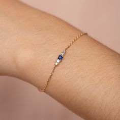 Blue Sapphire Diamond Bracelet 14K Gold - September Birthstone Birthday Gift for Her with Natural Gemstones D E T A I L S ● Metal: 14K solid gold, 14K white gold or 14K rose gold ● Gemstone: Blue Sapphire 0.13ct, Diamonds 2mm and 1.6mm 0.102 ct total, Brilliant Cut ● Length: 7 inches (18 cm) H O W ∙ T O ∙ O R D E R Choose from the drop-down menu the available options (Metal) and leave us a note for any special requirements. G I F T S All our pieces are delivered beautifully packaged and gift rea Sapphire Color Cubic Zirconia Diamond Bracelet Gift, Diamond Gemstone Bracelets As A Gift, Diamond Gemstone Jewelry For Birthday, Sapphire Round Diamond Bracelet Gift, Birthday Diamond Gemstone Jewelry, Diamond Birthstone Bracelets As Gift, Diamond Bracelet With Birthstone For Anniversary, Fine Jewelry Sapphire Diamond Bracelet, Sapphire Gemstone Diamond Bracelet For Anniversary