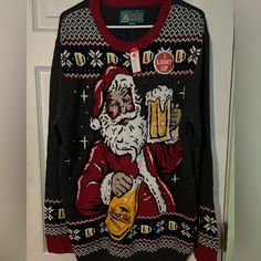 an ugly sweater with a santa clause holding a beer